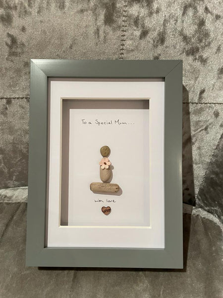 Happy Mothers Day design, Pebble Mummy holding a flower