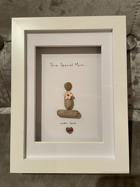 Happy Mothers Day design, Pebble Mummy holding a flower